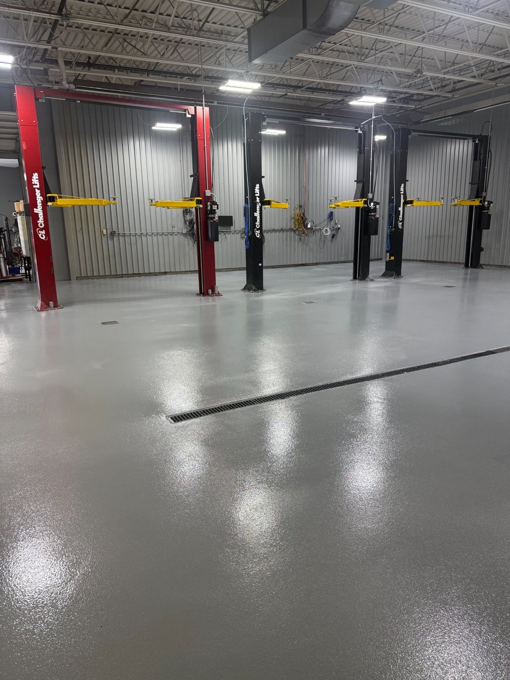 Finished epoxy broadcast floor at an Infinity dealer