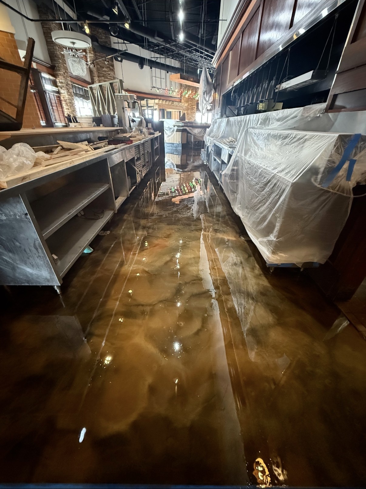 Real JJ Custom Flooring metallic epoxy commercial project